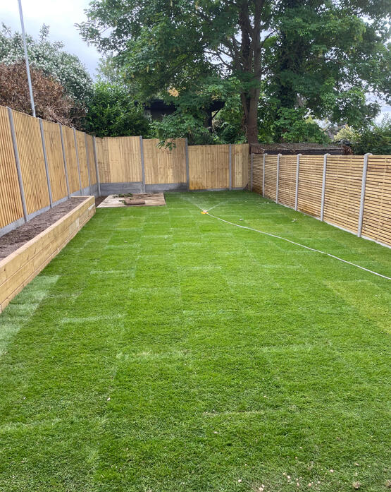 Fences &amp; posts &amp; gravel boards + top soil &amp; turfed + sleeper retaining wall/flower bed supplied and fitted