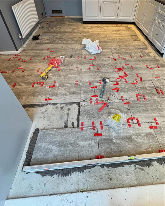 Tile flooring supplied and fitted (During)