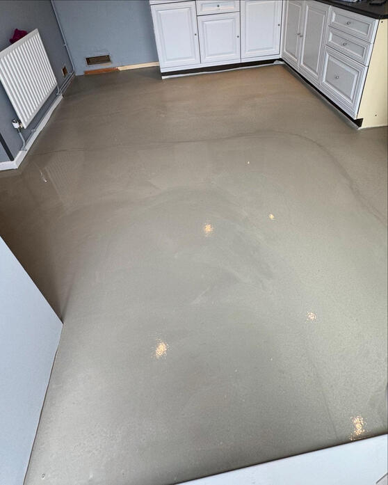 Tile flooring supplied and fitted (Before - Self leveling)