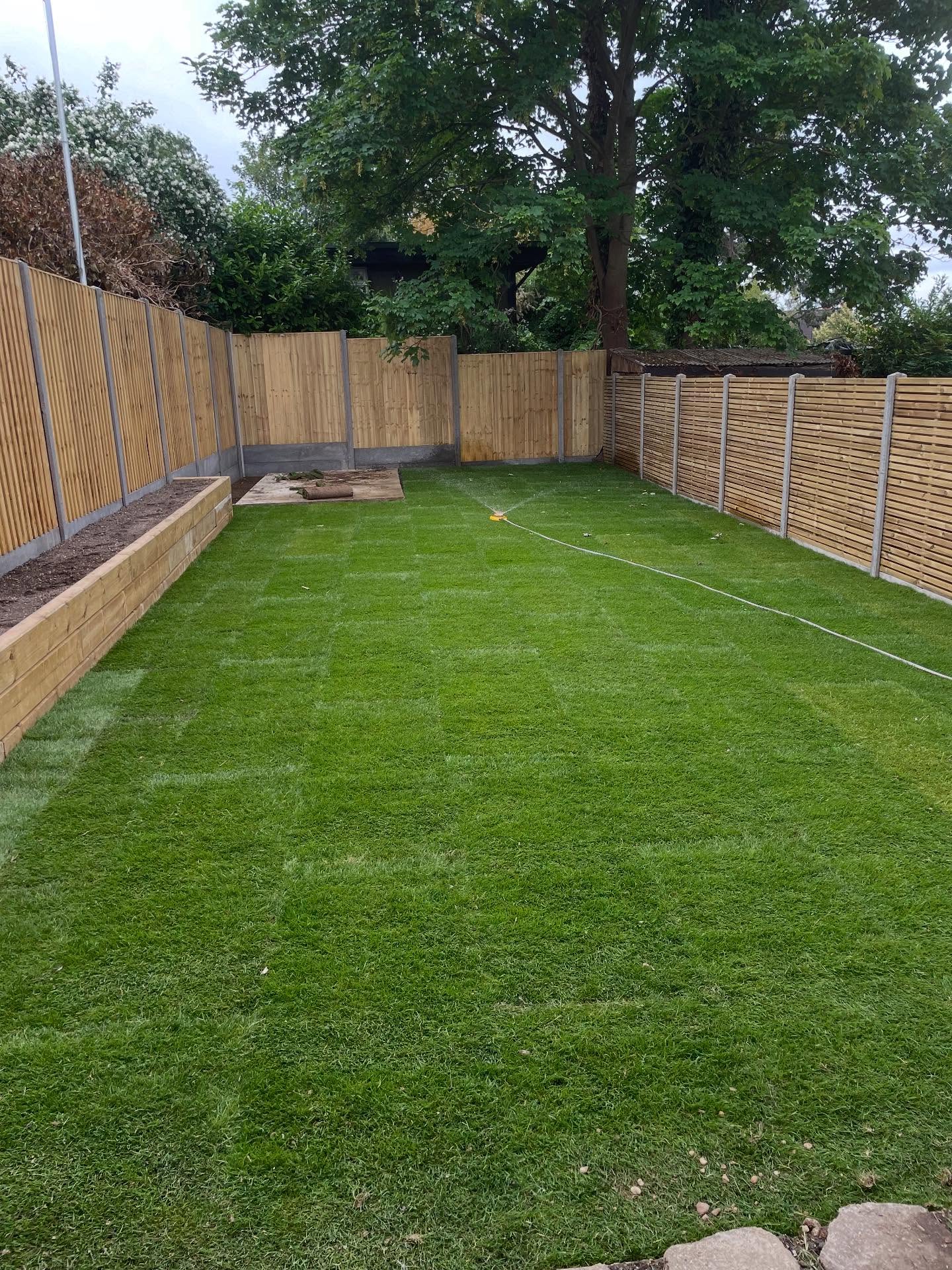 Full All Around Fencing Replacement + Sleeper Retaining Wall + Concrete Base + Turfed